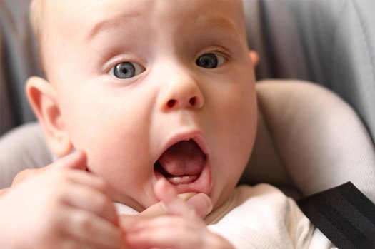 Baby smiling in the dental chair